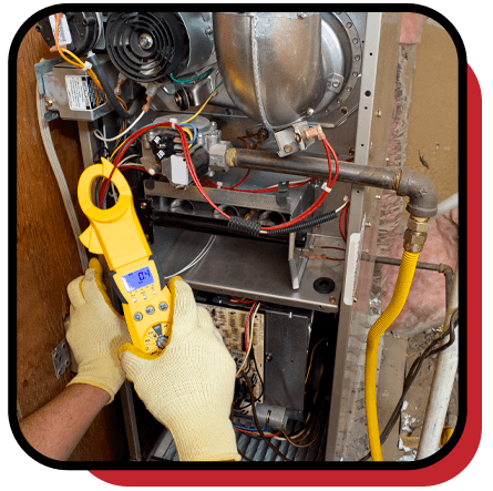 Zark Heating & Cooling technician servicing heating equipment